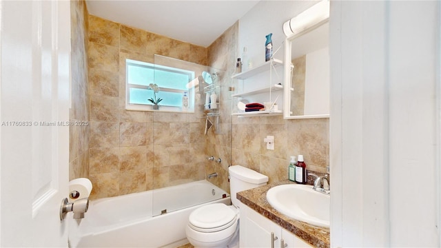 bathroom with toilet, backsplash, shower / bathing tub combination, tile walls, and vanity