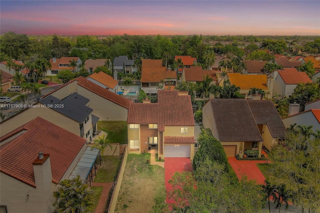 aerial view at dusk with a residential view