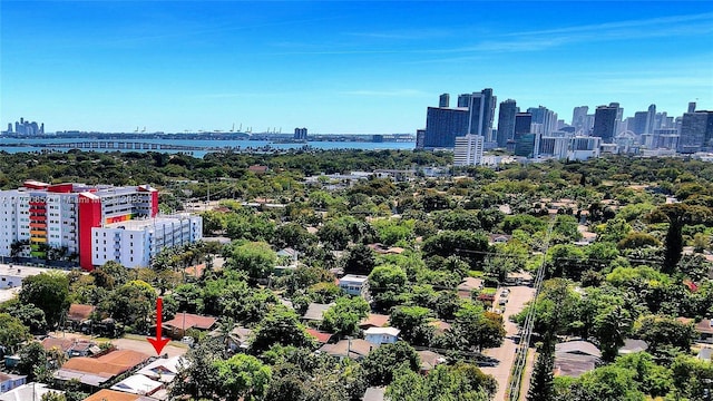 drone / aerial view with a water view and a view of city