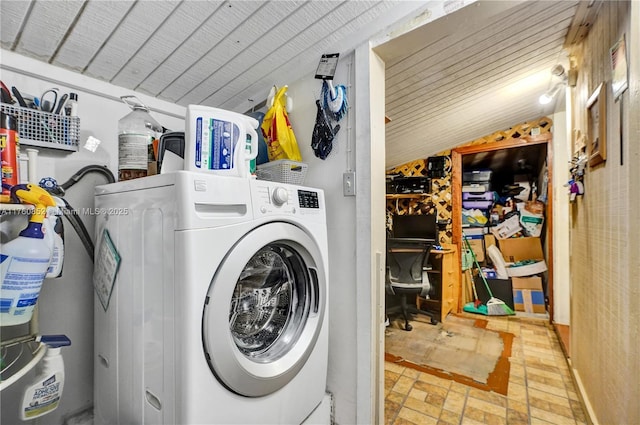 laundry area featuring laundry area and washer / clothes dryer