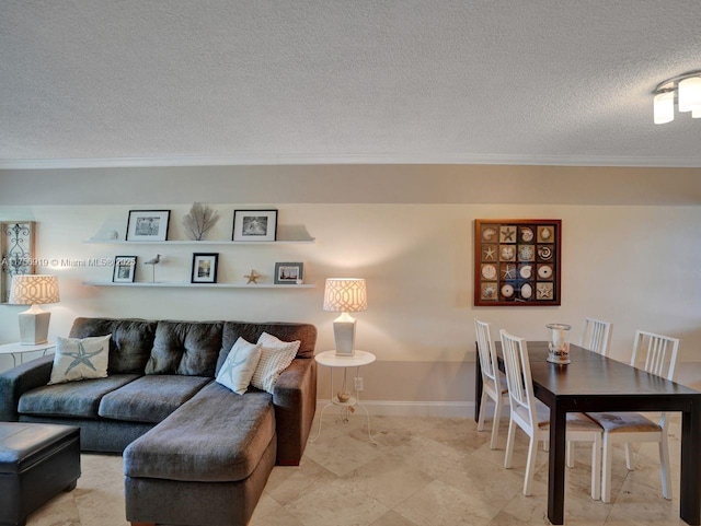 1900 NE 8th Ct Unit 306, Fort Lauderdale, FL 33304 - living room featuring a textured ceiling, baseboards, and ornamental molding