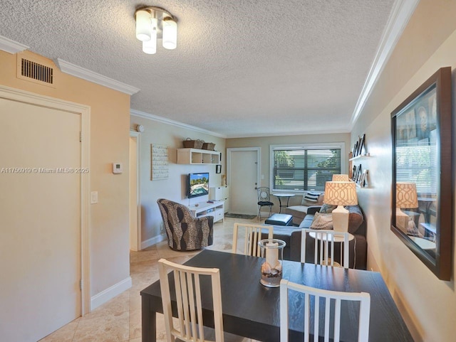 1900 NE 8th Ct Unit 306, Fort Lauderdale, FL 33304 - dining area featuring visible vents, a textured ceiling, crown molding, light tile patterned floors, and baseboards