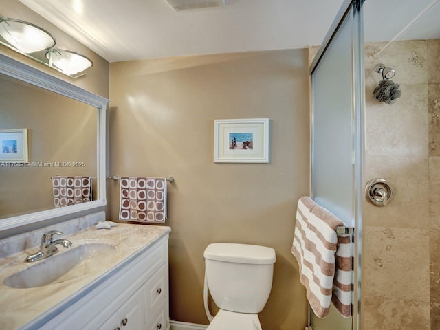 1900 NE 8th Ct Unit 306, Fort Lauderdale, FL 33304 - full bathroom featuring vanity, toilet, and tiled shower