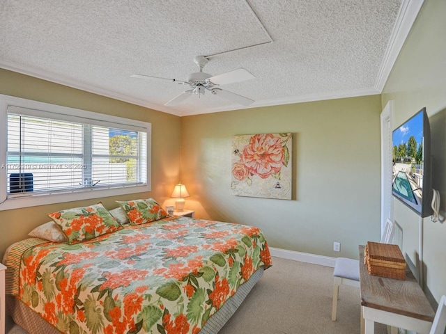 1900 NE 8th Ct Unit 306, Fort Lauderdale, FL 33304 - bedroom featuring a ceiling fan, a textured ceiling, carpet flooring, crown molding, and baseboards