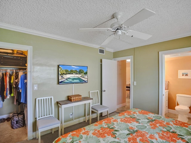 1900 NE 8th Ct Unit 306, Fort Lauderdale, FL 33304 - bedroom with a spacious closet, visible vents, a textured ceiling, and a closet