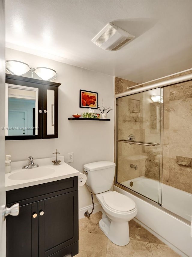 1900 NE 8th Ct Unit 306, Fort Lauderdale, FL 33304 - full bath featuring vanity, visible vents, shower / bath combination with glass door, tile patterned flooring, and toilet