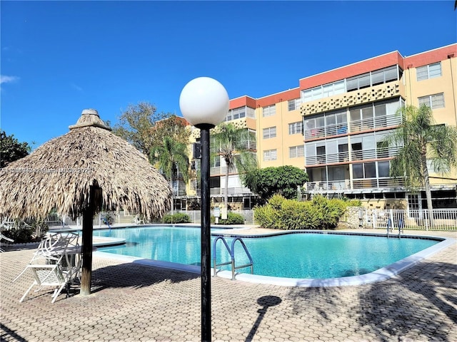 community pool with fence