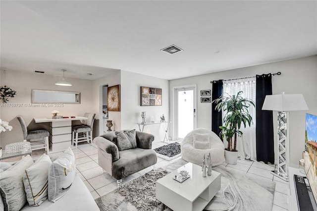 6069 SW 35th St, Miramar, FL 33023 - living area with light tile patterned floors