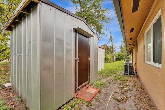 view of shed featuring central AC unit