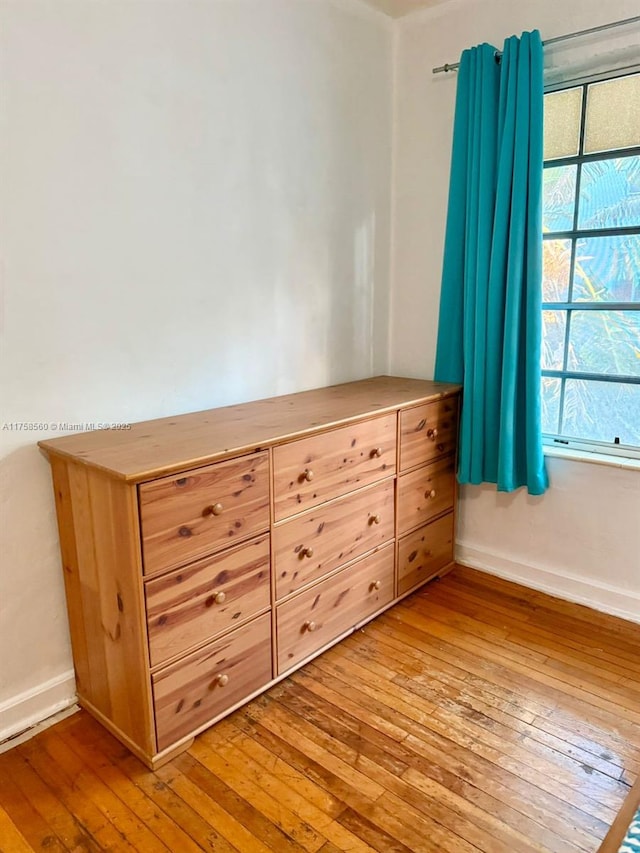 830 Euclid Ave Unit 8, Miami Beach, FL 33139 - unfurnished bedroom with light wood-style floors and baseboards