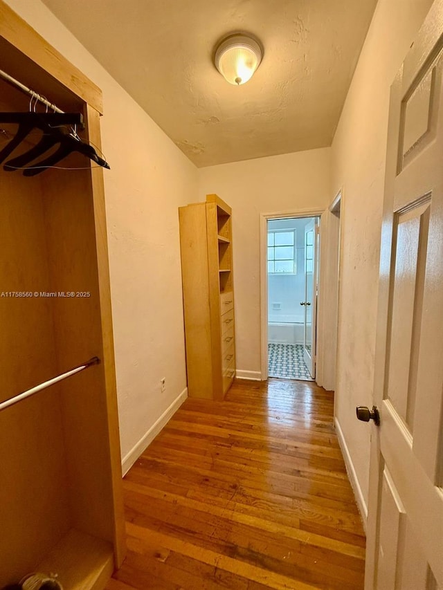 830 Euclid Ave Unit 8, Miami Beach, FL 33139 - hallway with hardwood / wood-style floors and baseboards