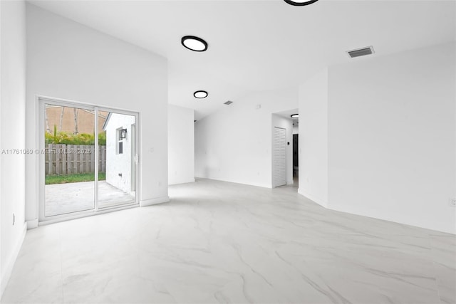 834 Cumberland Ter, Davie, FL 33325 - empty room with baseboards, marble finish floors, and high vaulted ceiling
