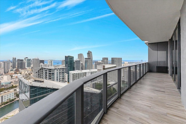 balcony with a city view and a water view