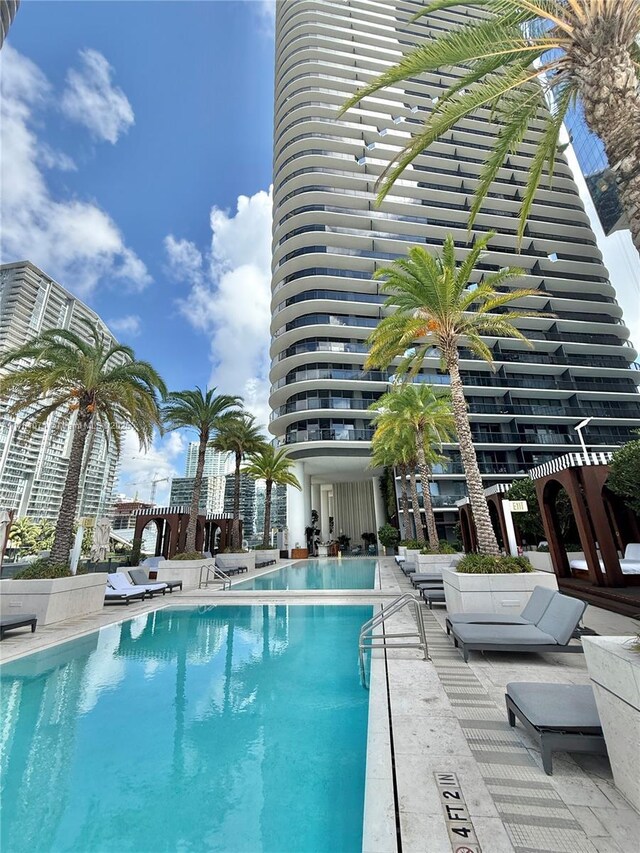 801 S Miami Ave Unit 5509, Miami, FL 33130 - community pool featuring a patio