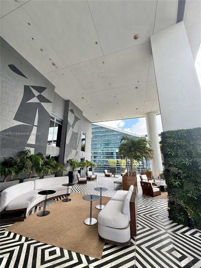 801 S Miami Ave Unit 5509, Miami, FL 33130 - community lobby with floor to ceiling windows and a high ceiling