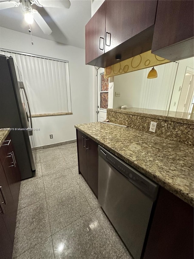 kitchen with baseboards, granite finish floor, freestanding refrigerator, ceiling fan, and dishwasher