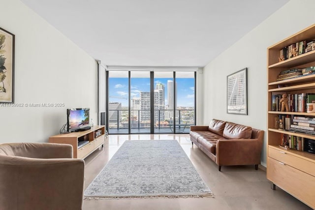 living room with concrete floors and expansive windows
