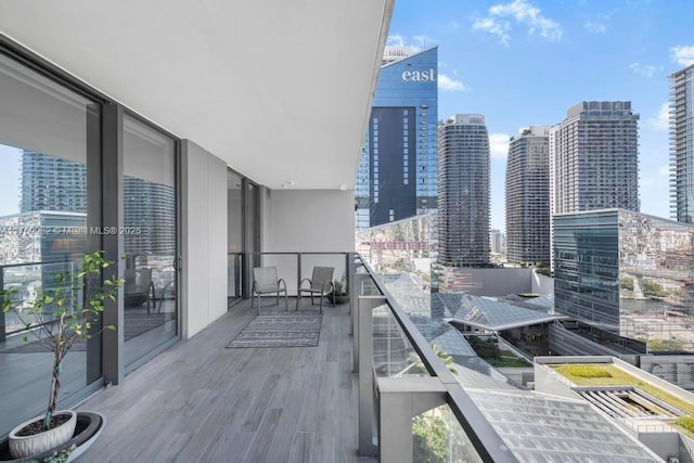 balcony featuring a view of city