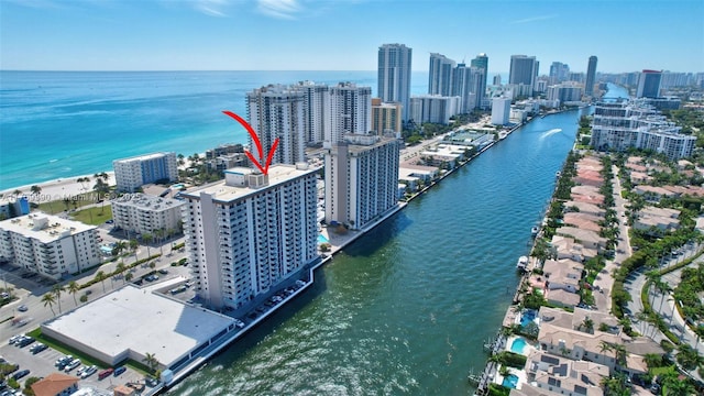 bird's eye view featuring a city view and a water view