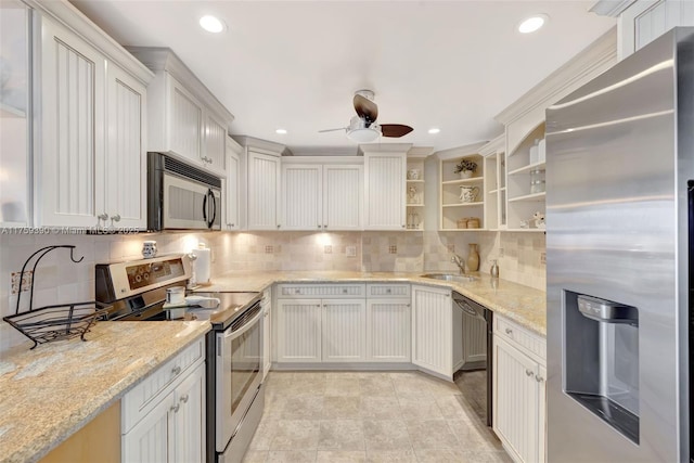 kitchen with open shelves, a sink, tasteful backsplash, recessed lighting, and stainless steel appliances