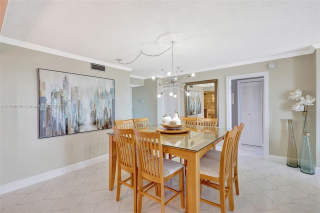 dining space featuring visible vents, baseboards, a notable chandelier, and crown molding