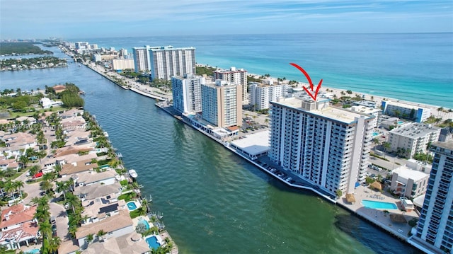 bird's eye view with a city view and a water view