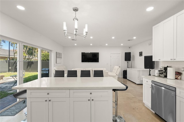 kitchen featuring a kitchen breakfast bar, recessed lighting, white cabinets, light countertops, and dishwasher