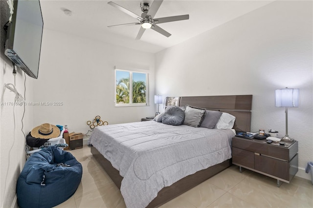 bedroom featuring light tile patterned floors and ceiling fan