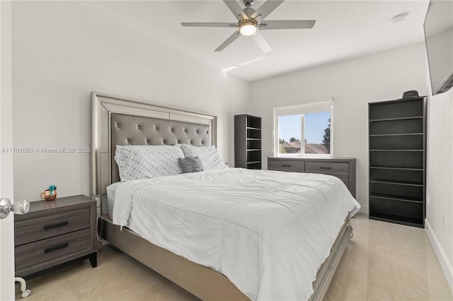 bedroom with baseboards and ceiling fan