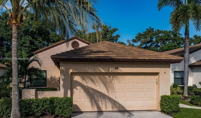 garage with driveway