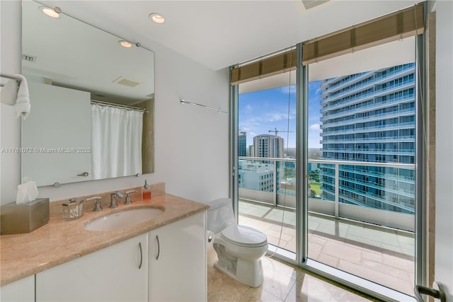 full bath with a view of city, floor to ceiling windows, toilet, and visible vents