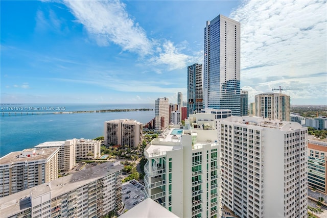 property's view of city featuring a water view