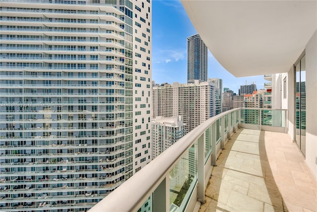 balcony featuring a view of city