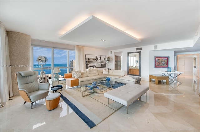 living room with visible vents and marble finish floor