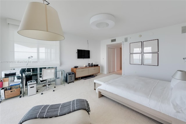 bedroom featuring visible vents and carpet