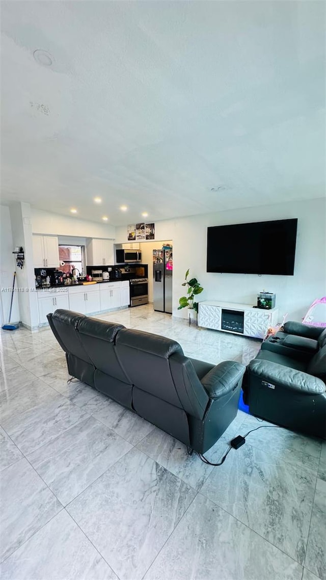 living room with marble finish floor