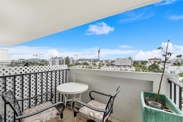 balcony featuring a city view