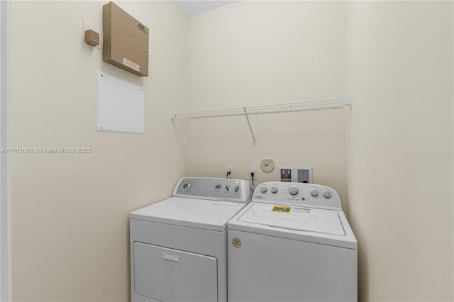 laundry room featuring laundry area and washing machine and dryer