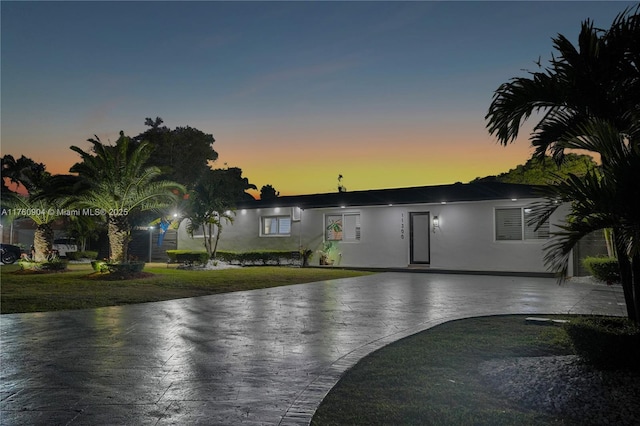 11300 SW 107th Ave, Miami, FL 33176 - view of front of property with a front yard and stucco siding