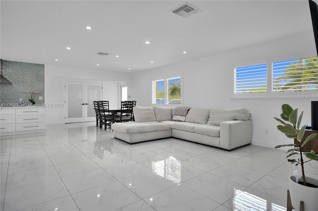 11300 SW 107th Ave, Miami, FL 33176 - living area with light marble finish flooring, baseboards, french doors, and recessed lighting