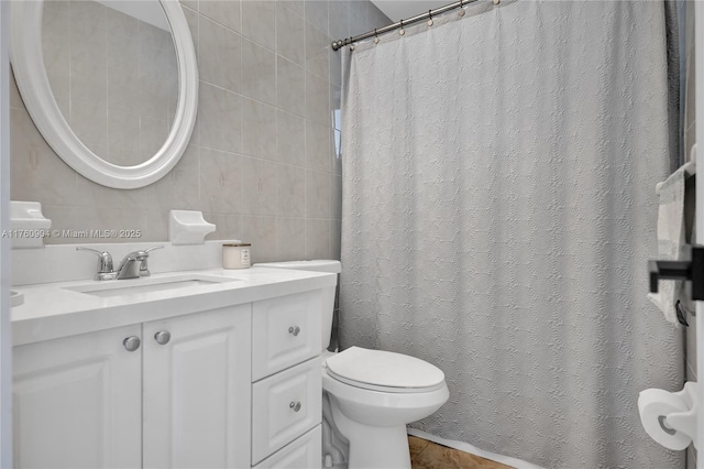 11300 SW 107th Ave, Miami, FL 33176 - full bath featuring tile walls, vanity, toilet, a shower with shower curtain, and tile patterned flooring
