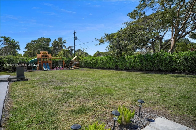 11300 SW 107th Ave, Miami, FL 33176 - view of grassy yard with a playground