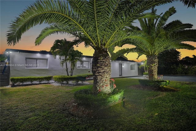 11300 SW 107th Ave, Miami, FL 33176 - view of side of property with stucco siding and a yard