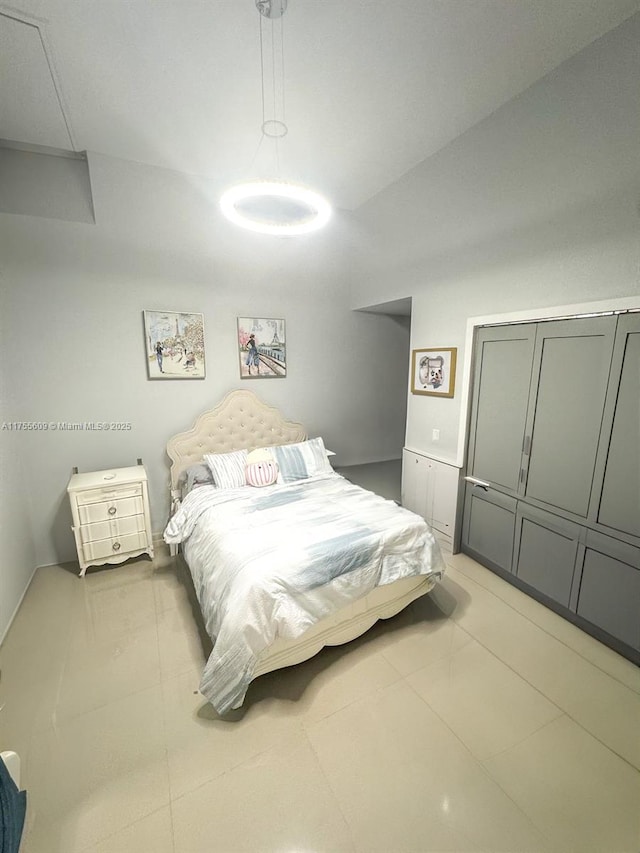 bedroom featuring light tile patterned floors