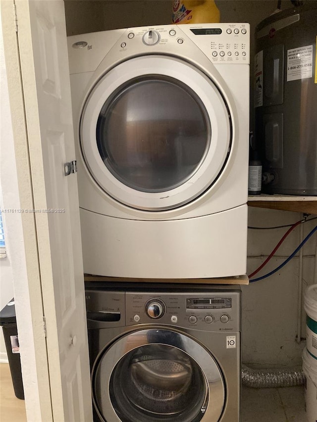 laundry area with laundry area and stacked washing maching and dryer