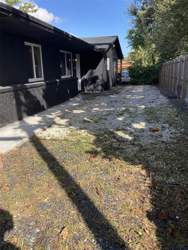 view of yard with fence