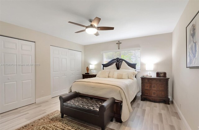 bedroom featuring light wood-style floors, baseboards, a ceiling fan, and a closet
