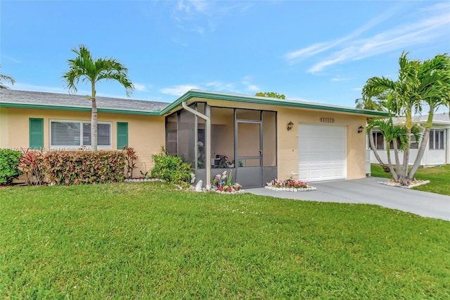 ranch-style house featuring a garage, a front yard, stucco siding, a sunroom, and driveway