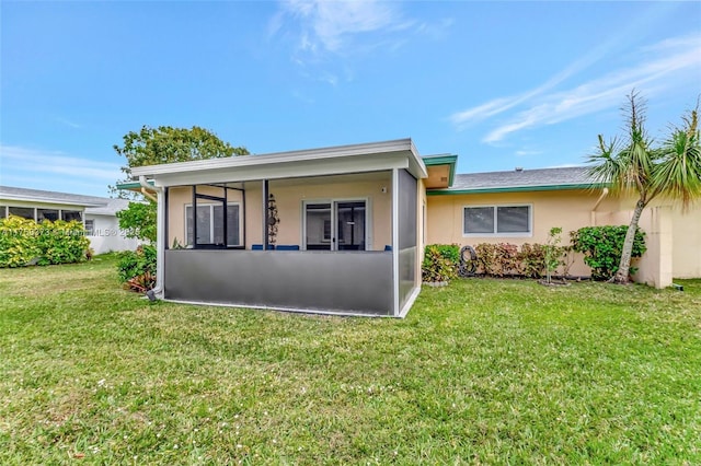 13255 Via Vesta Unit B, Delray Beach, FL 33484 - view of front of home featuring a front yard and stucco siding