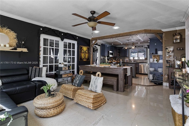 living room with ceiling fan, french doors, and ornamental molding